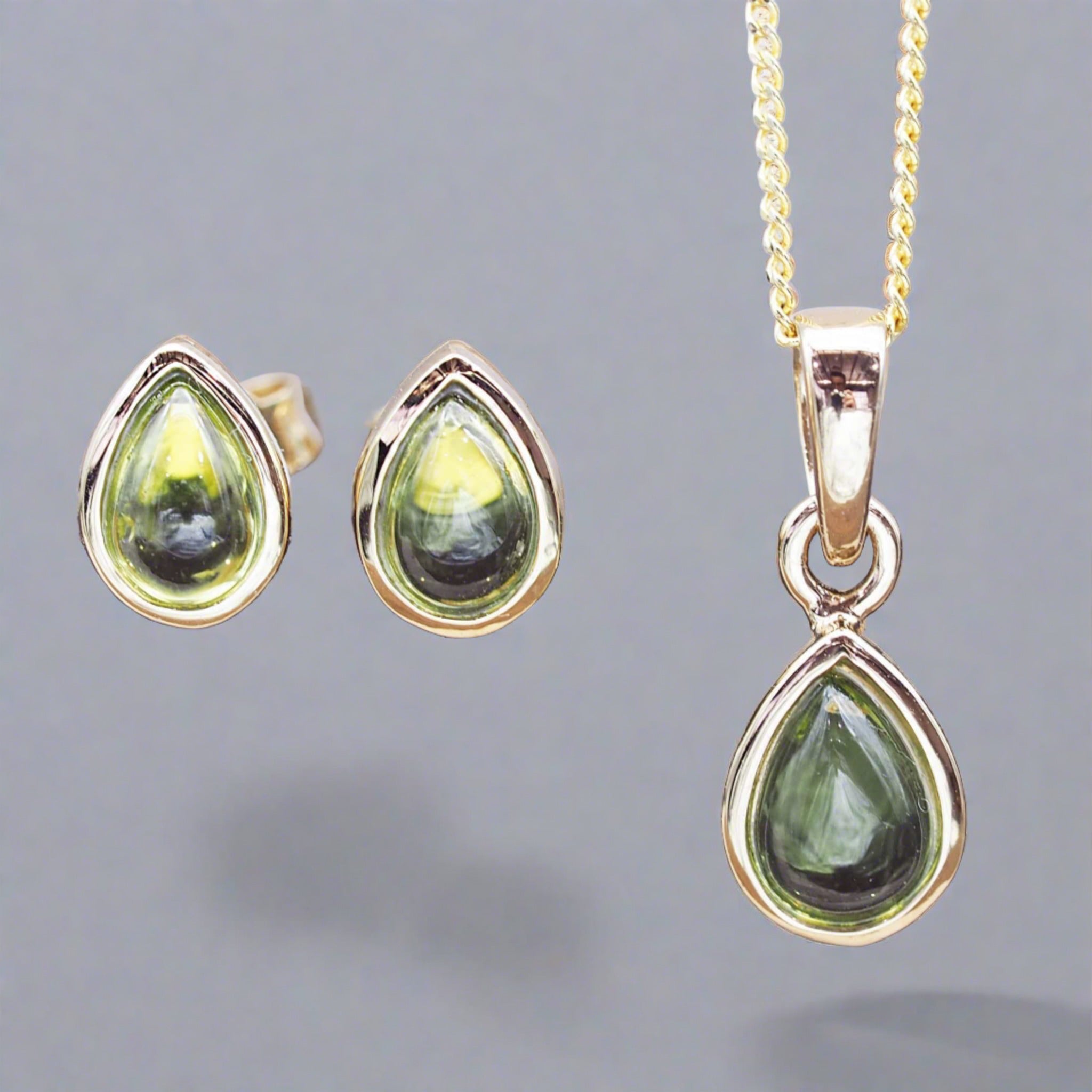gold August birthstone peridot jewellery set featuring peridot earrings and peridot necklace by indie and harper