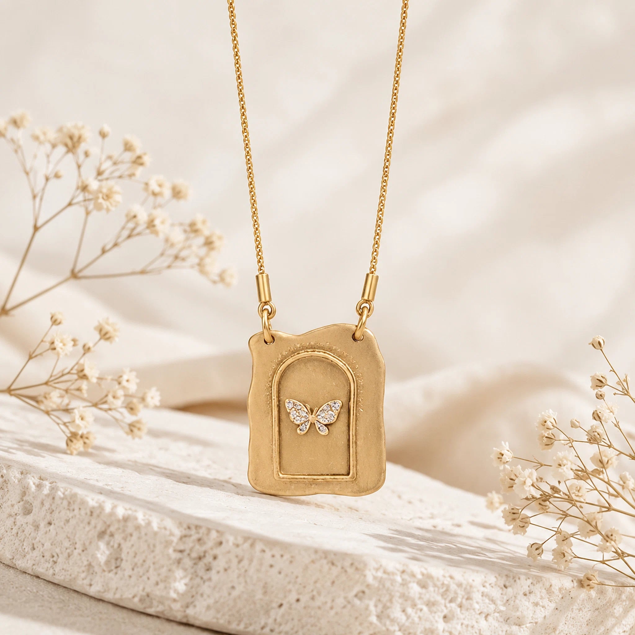gold pendant necklace with CZ butterlfy