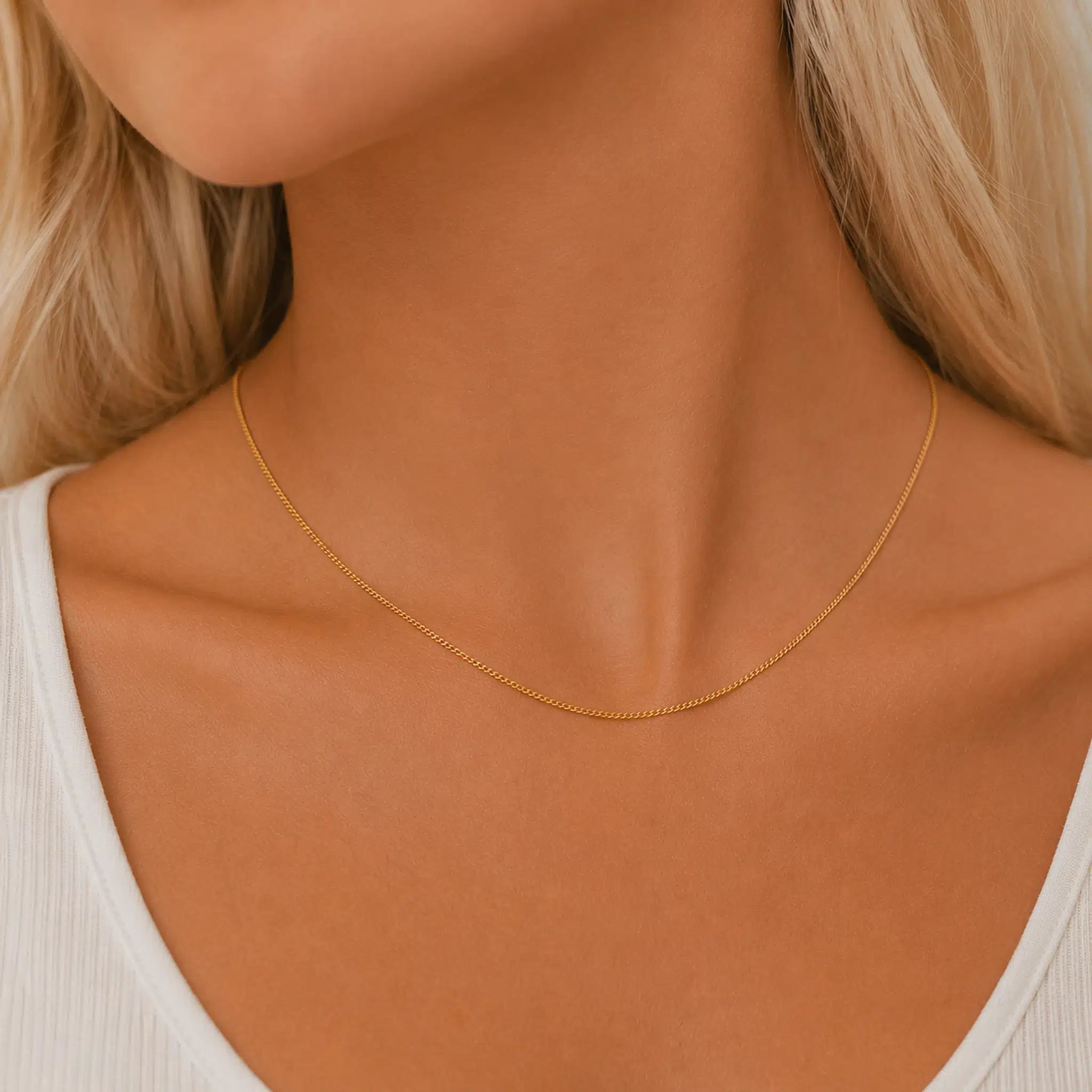 minimalist 16 inch Gold chain necklace on a person with a neutral background