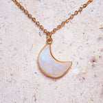 gold plated chain with a crescent moon shaped natural Moonstone pendant eel.