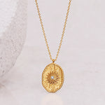 gold cz sunburst pendant necklace