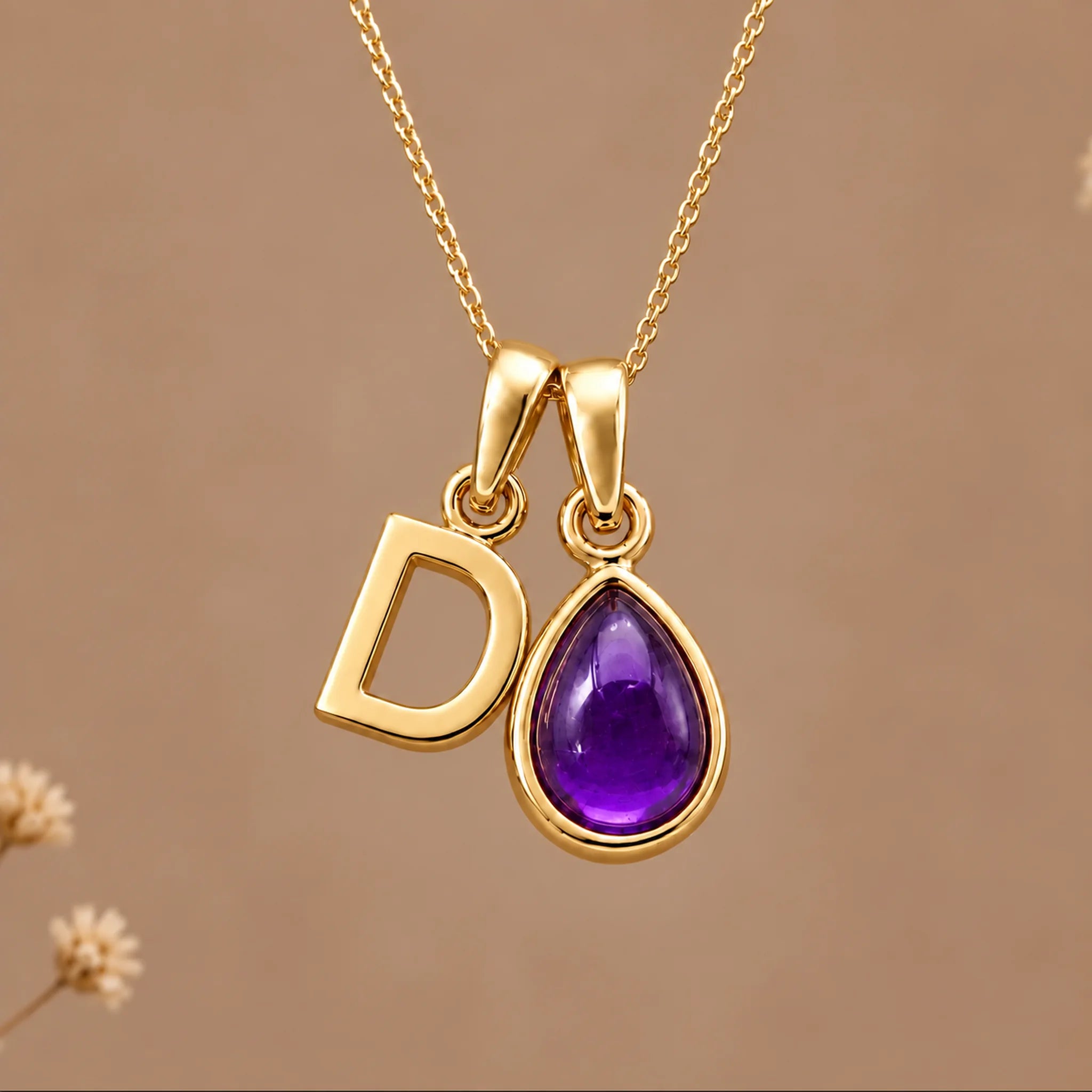 Gold initial D necklace with a natural February amethyst