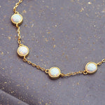 dainty opal bracelet - sterling silver bracelet with gold plating and synthetic white opals - women's jewellery online by indie and harper
