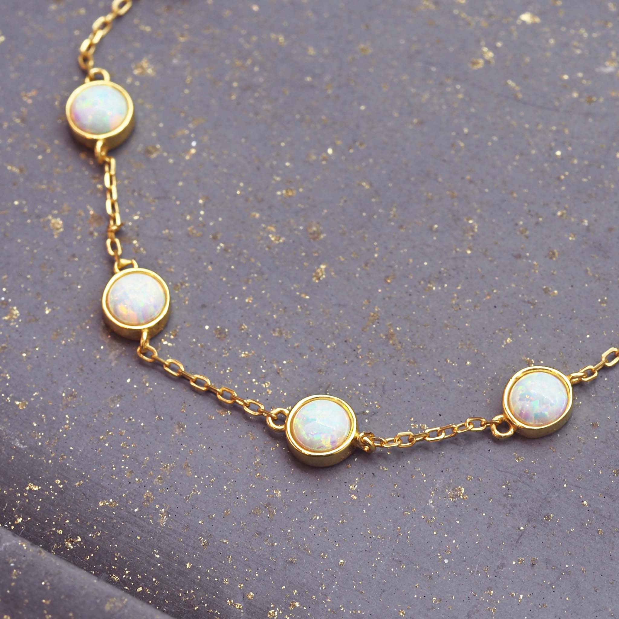 dainty opal bracelet - sterling silver bracelet with gold plating and synthetic white opals - women's jewellery online by indie and harper