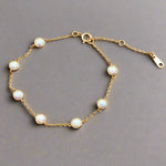 dainty gold bracelet made with sterling silver, gold plating and dainty opals - women's bracelets by online jewellery brand indie and harper