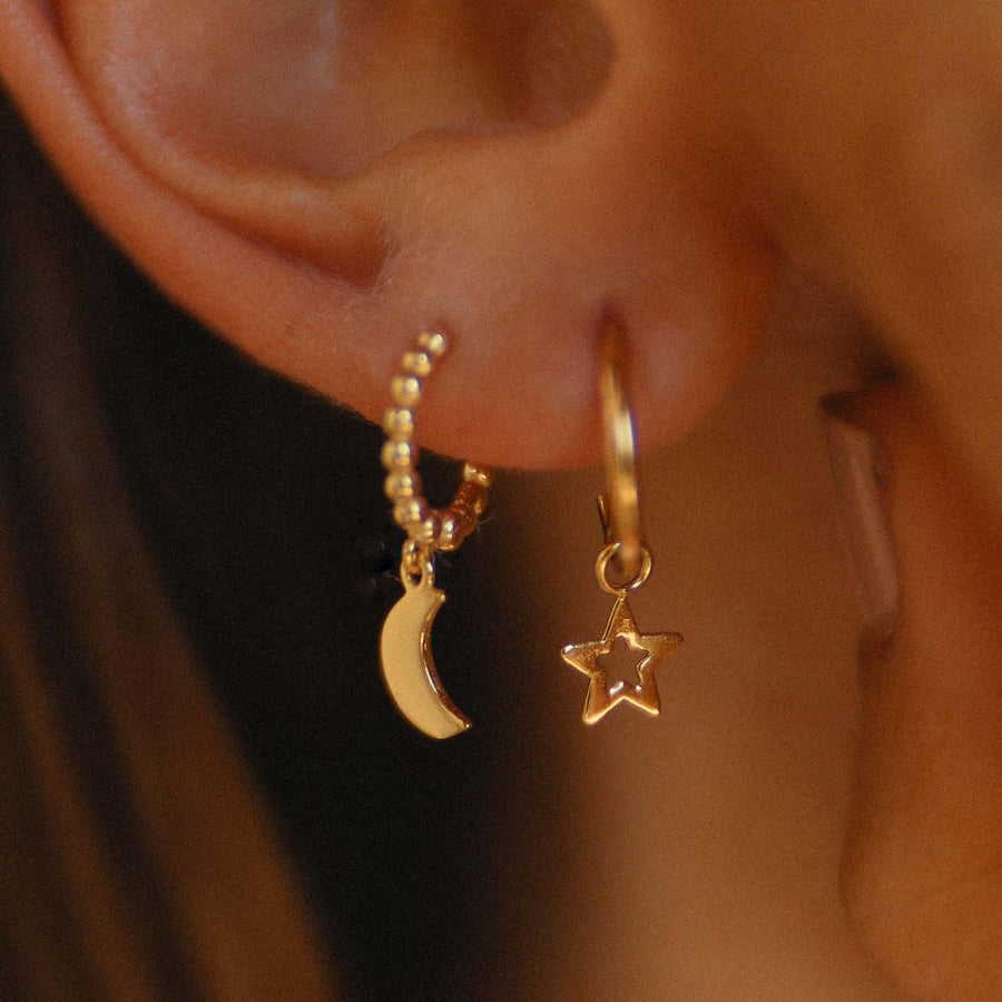 Woman wearing Gold earrings - womens gold jewellery Australia 