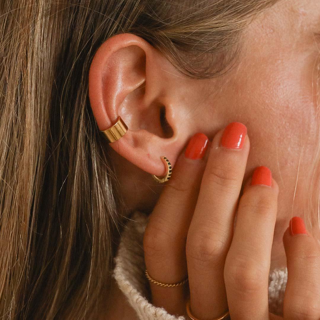 Woman wearing gold Ear Cuffs - gold waterproof jewellery by indie and harper australia