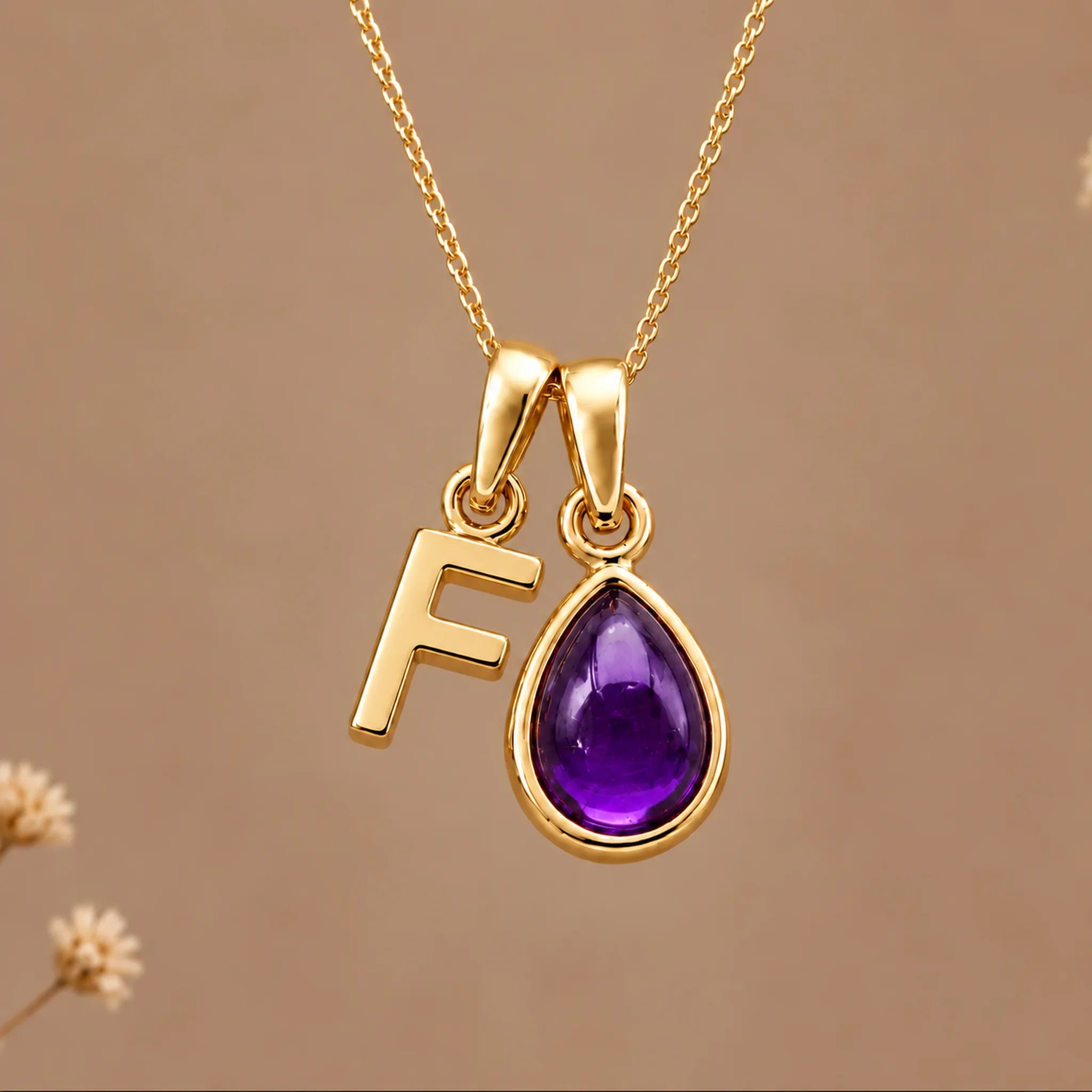 Gold initial F necklace with a natural February amethyst