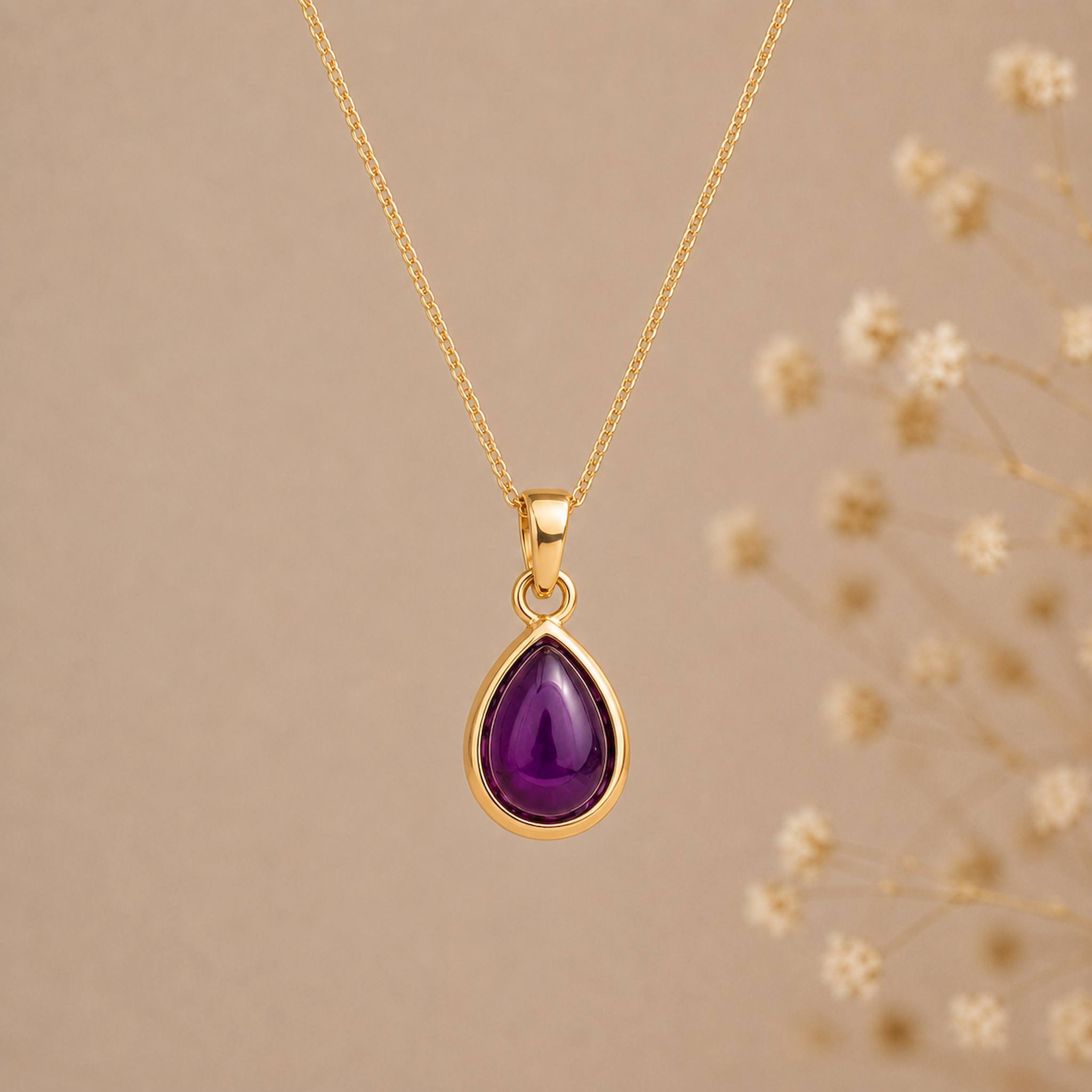 Gold February Birthstone necklace with a pear-shaped natural amethyst gemstone pendant - birthday jewellery gift