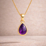 Gold February Birthstone necklace with a pear-shaped natural amethyst gemstone pendant - birthday jewellery gift