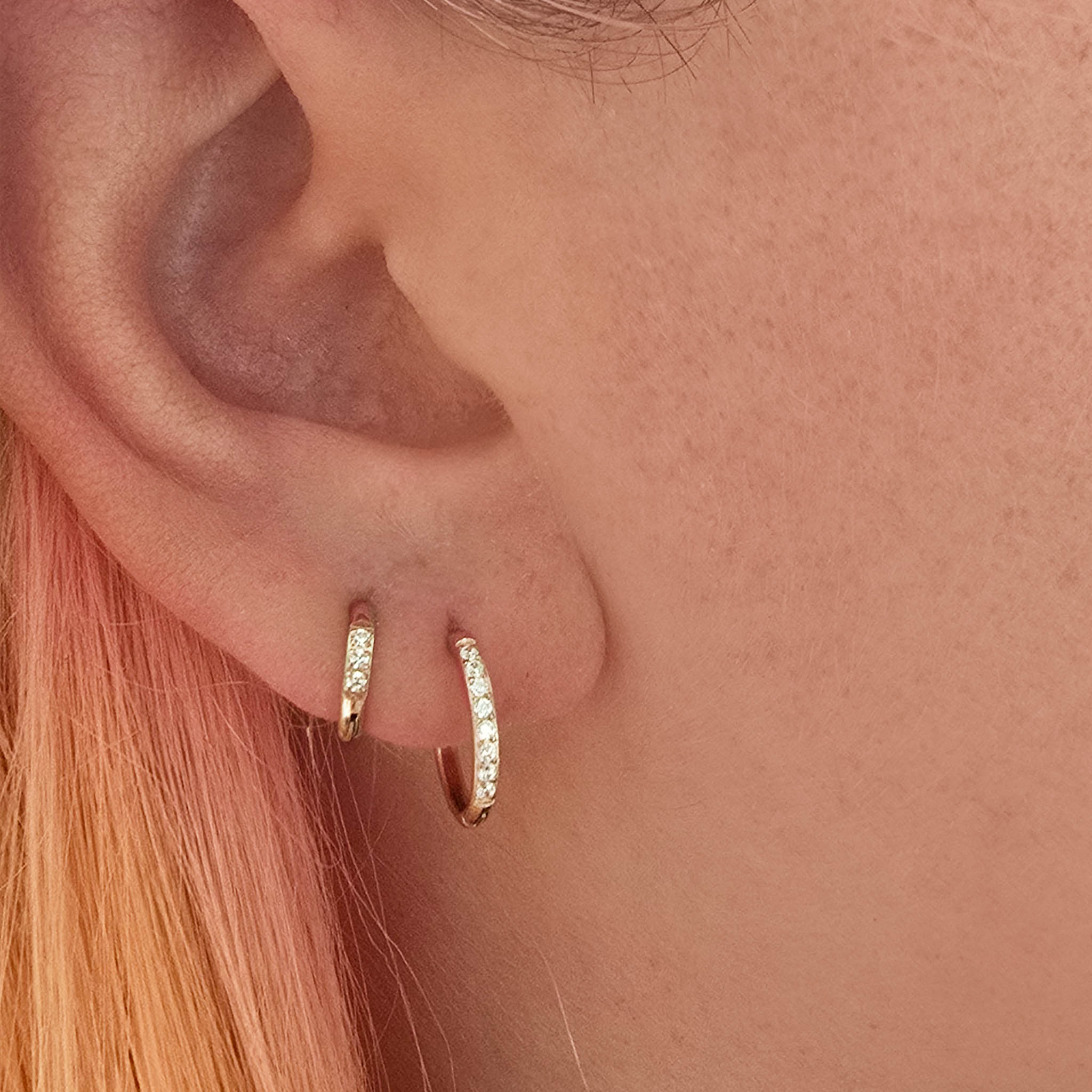 waterproof stainless steel pavé gold huggie hoop earrings worn