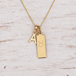 Gold Initial and Taurus Zodiac Necklace with letter A pendant