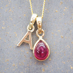 gold initial a pendant and july birthstone ruby necklace by indie and harper australia