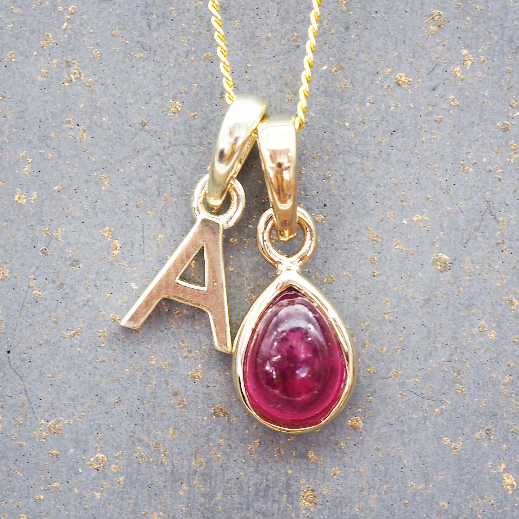 gold initial a pendant and july birthstone ruby necklace by indie and harper australia