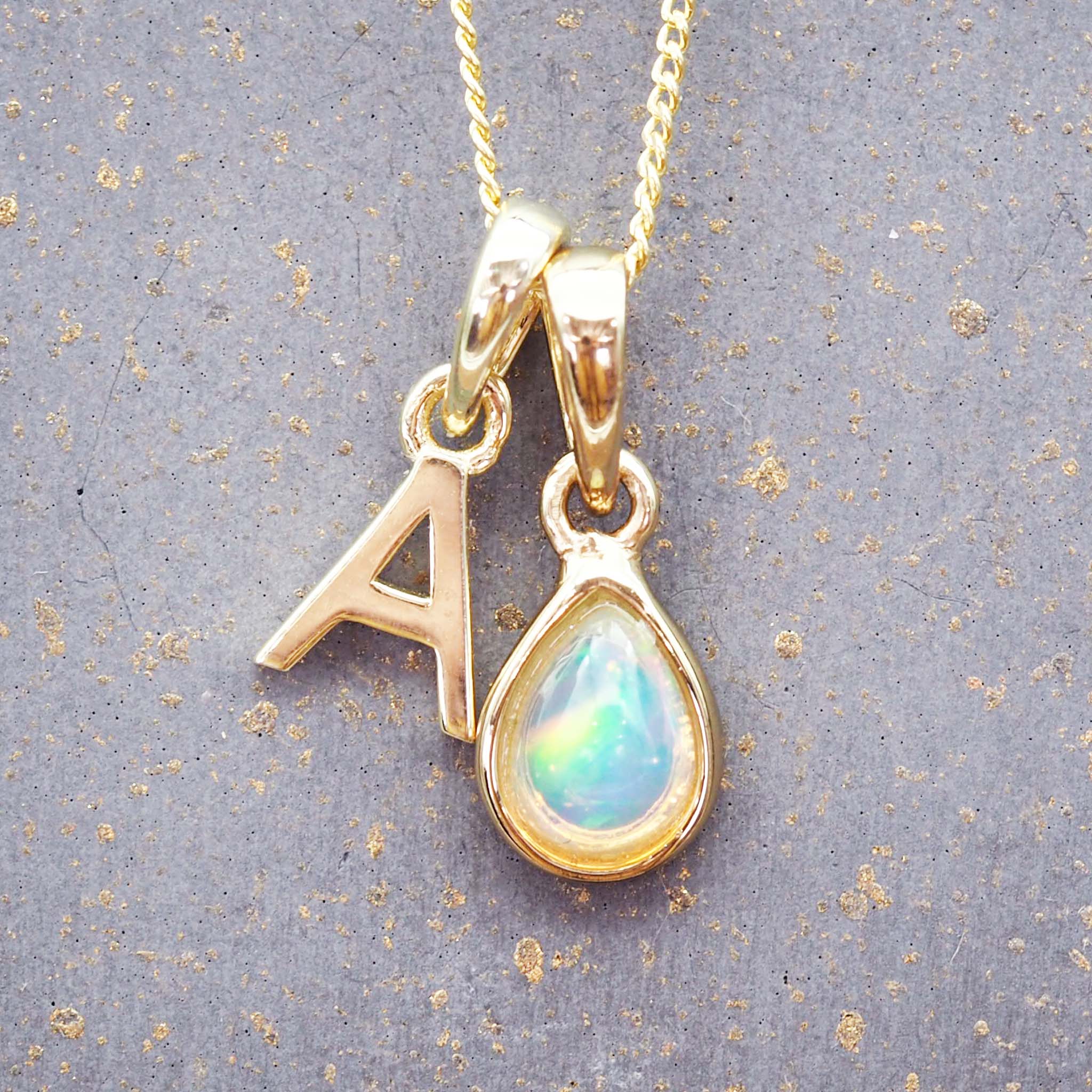 gold initial a and october birthstone opal necklace by indie and harper australia