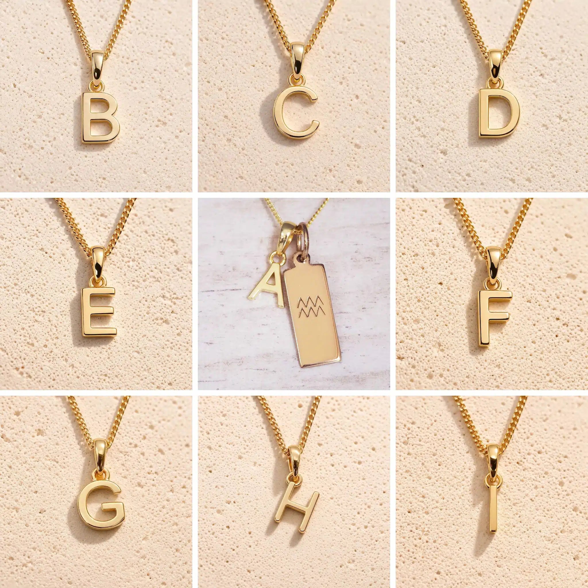 Collection of gold fine chain necklaces with gold letter pendants A to I, as personalised initial charms for Aquarius Zodiac Necklace on a beige background
