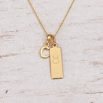 Gold Initial and Taurus Zodiac Necklace with letter C pendant