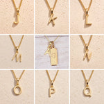 Collage of gold necklaces with letter charm pendants j, k, l, m, n, o, p, q on a beige background as gold initial pendant options to personalise a Cancer Zodiac Necklace.
