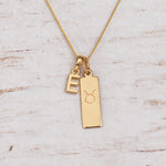 Gold Initial and Taurus Zodiac Necklace with letter E pendant
