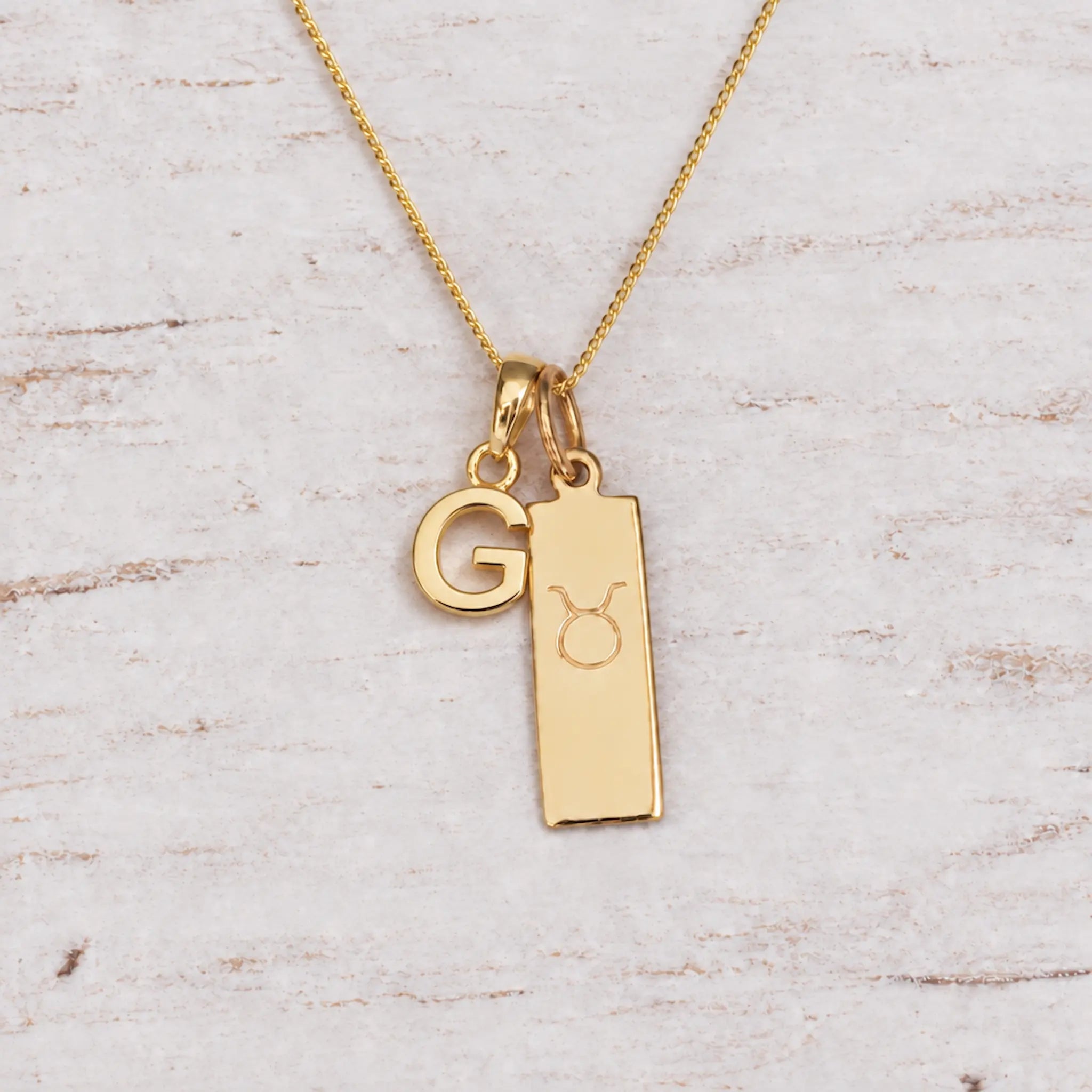 Gold Initial and Taurus Zodiac Necklace with letter G pendant