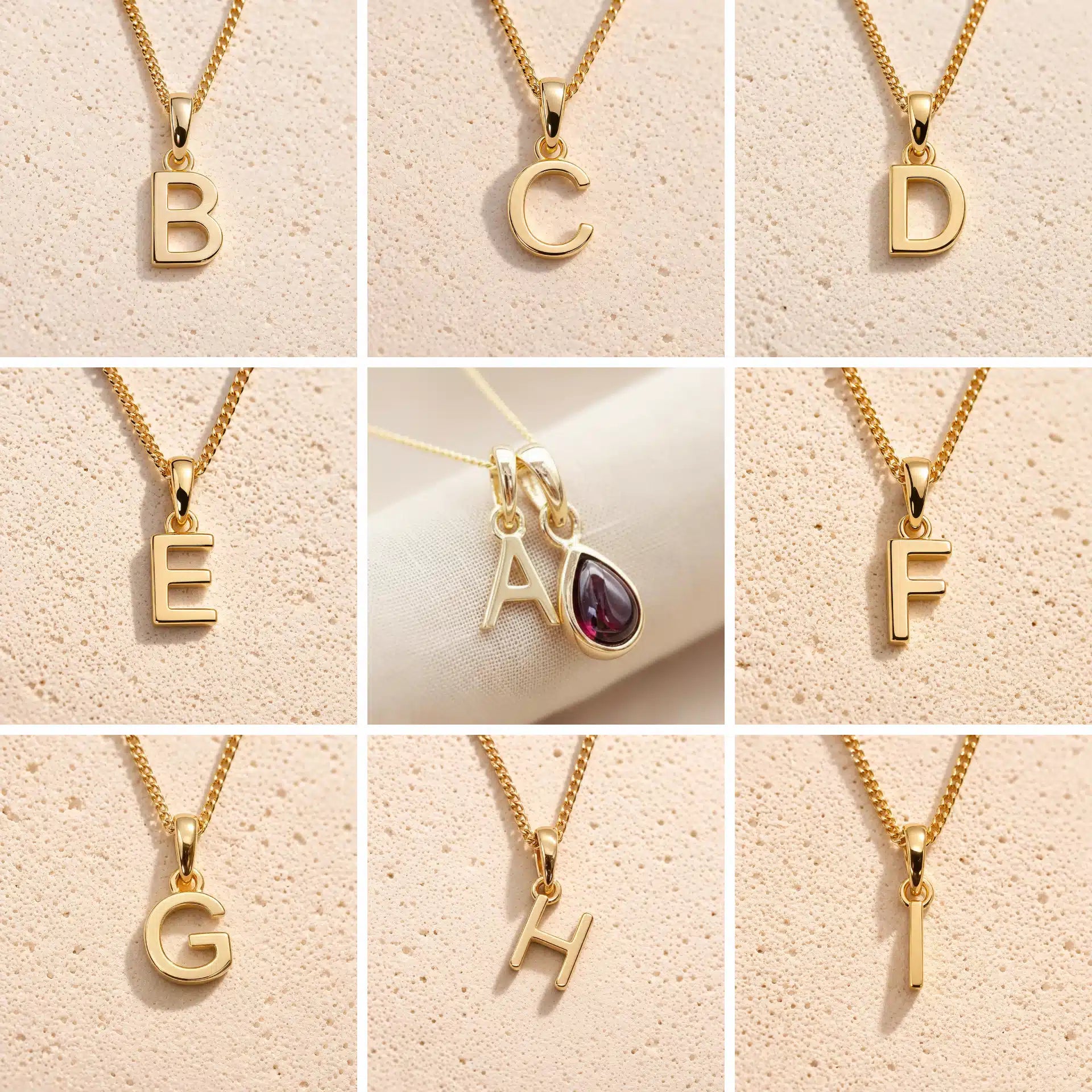 Gold january birthstone birthstone garnet necklaces with letters A to H on a beige background