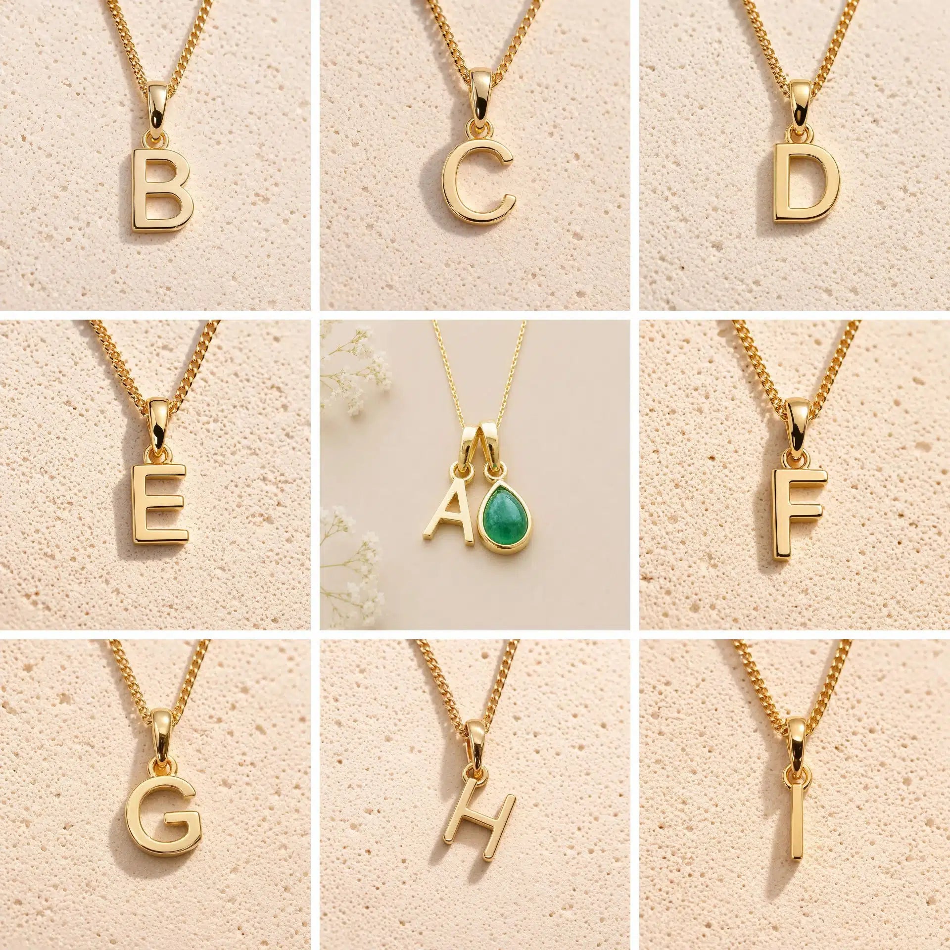 Collection of gold fine chain necklaces with uppercase gold letter pendants  on a beige background with B, C, D, E, A, F, G, H, I initials as options for a May Birthstone Emerald Necklace.