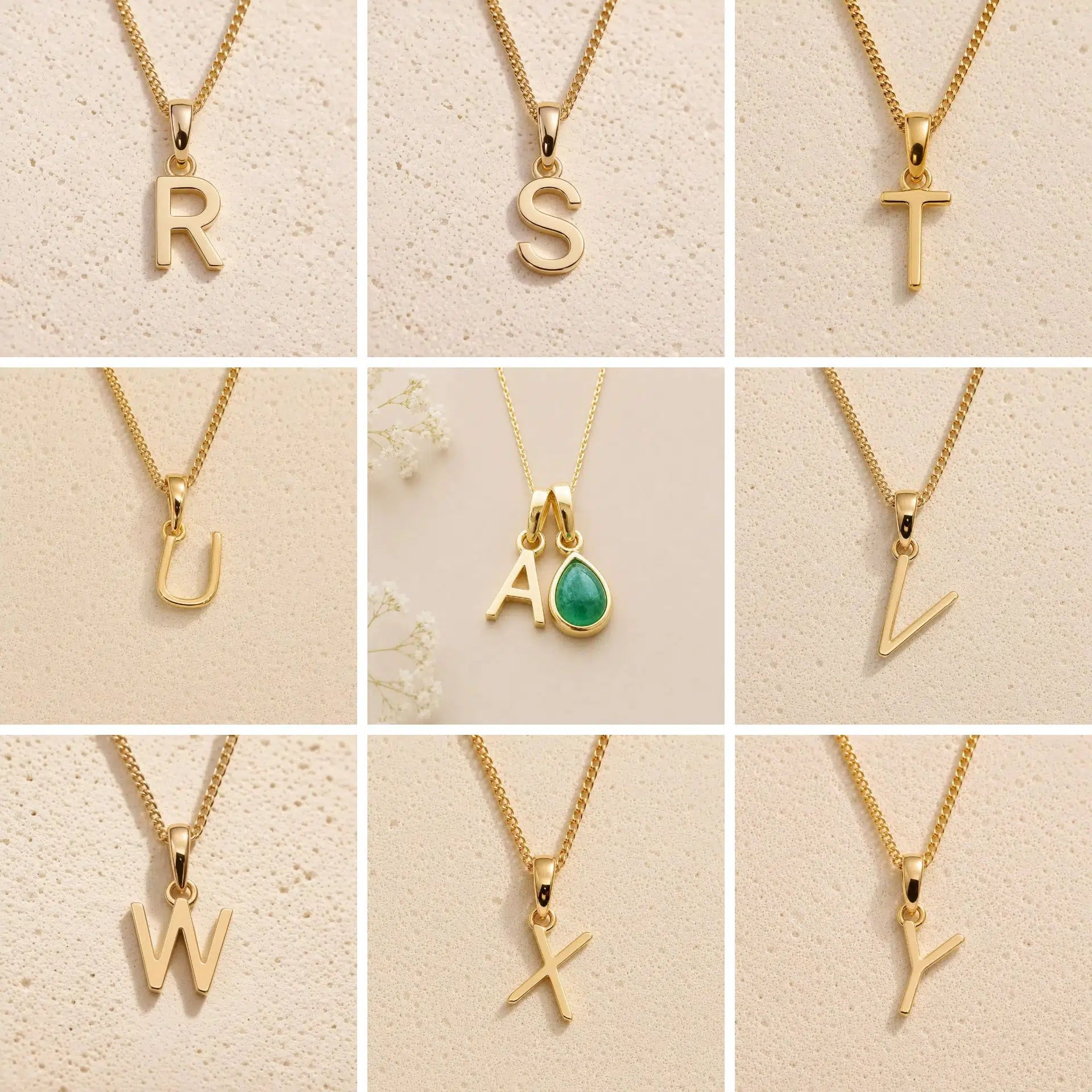 Collection of gold fine chain necklaces with uppercase gold letter pendants  on a beige background, S, T, Y, A, V, W, X, Y initials as options for a May Birthstone Emerald Necklace.