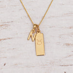 Gold Initial and Taurus Zodiac Necklace with letter N pendant