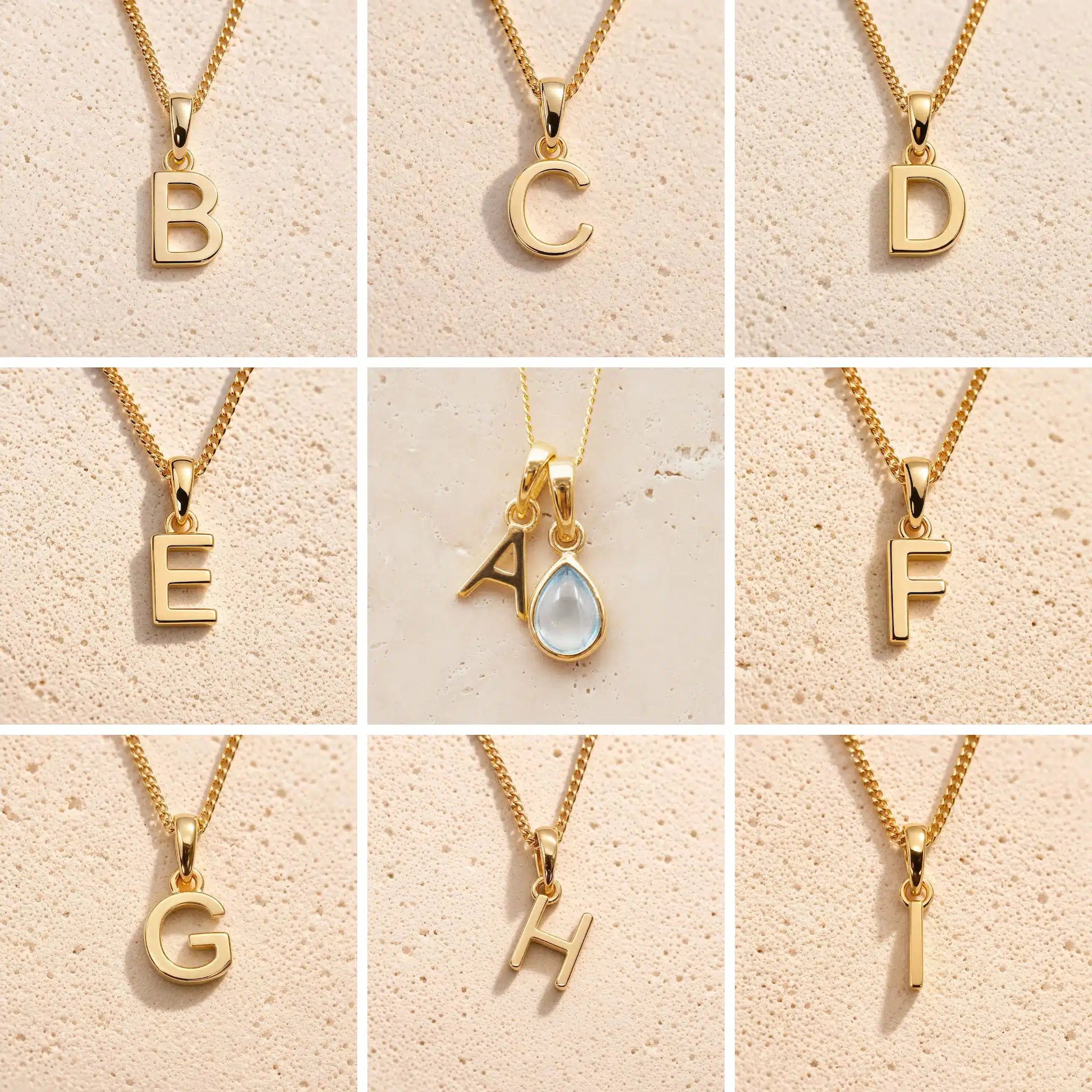 Gold necklaces with letters A to H on a beige background showing the personalised gold letters available for the November Birthstone Blue Topaz Necklace.