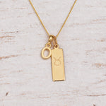 Gold Initial and Taurus Zodiac Necklace with letter O pendant