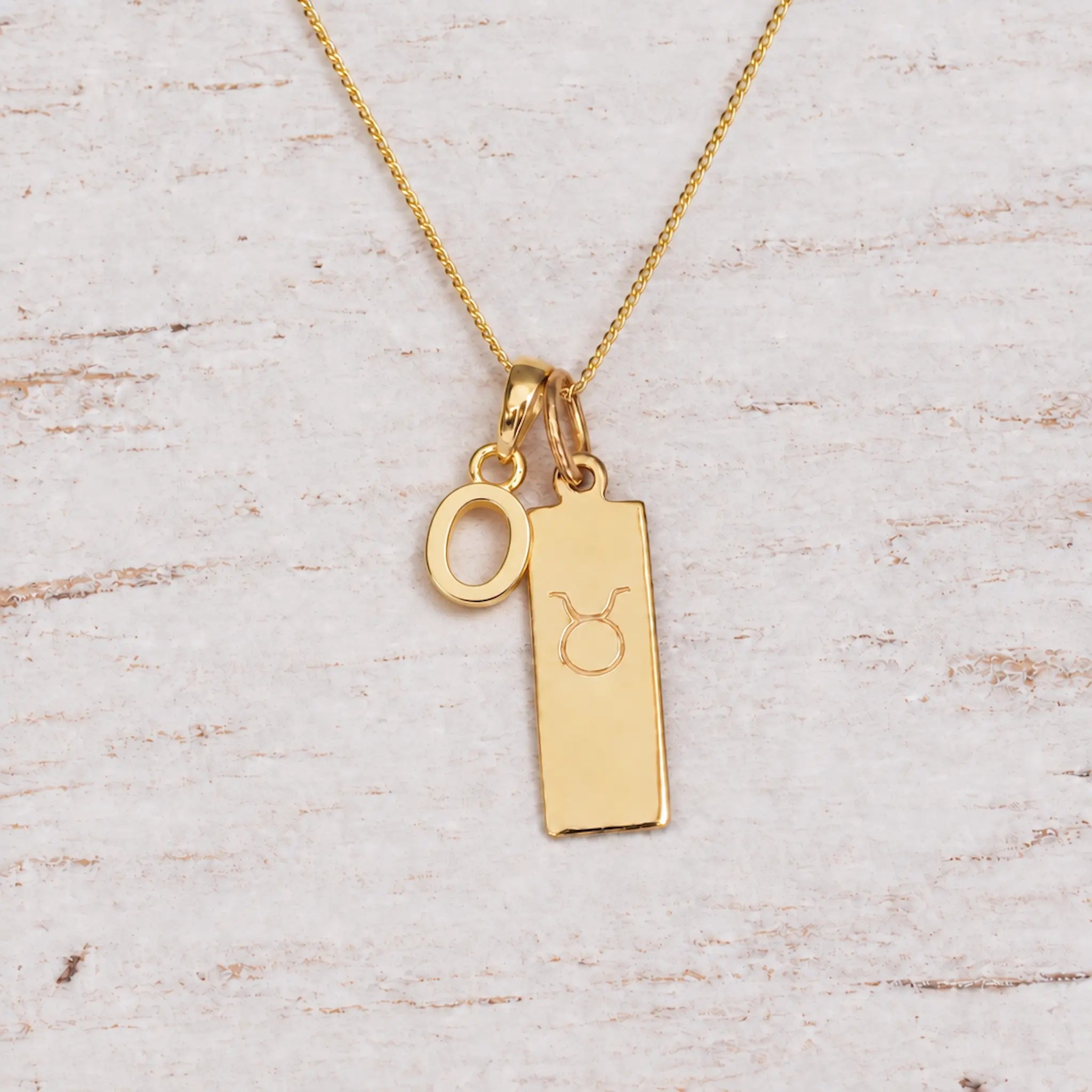 Gold Initial and Taurus Zodiac Necklace with letter O pendant