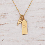 Gold Initial and Taurus Zodiac Necklace with letter P pendant