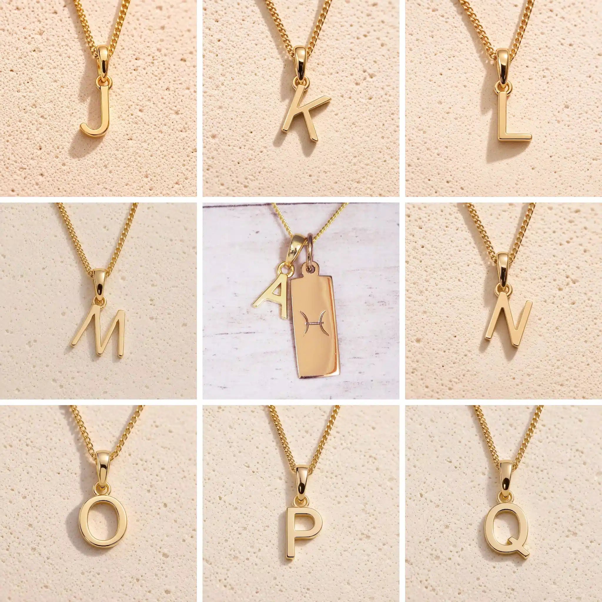 3x3 grid showing personalised gold initial necklace options J, K, L, M, N, O, P and Q, with the centre image featuring the Pisces zodiac double-pendant necklace with an uppercase A charm and engraved rectangular bar tag on a fine cable chain.