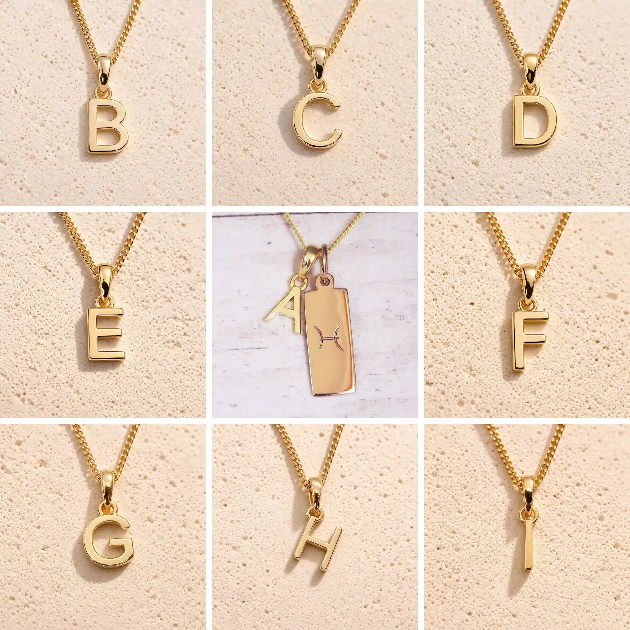 3x3 grid showing personalised gold initial necklace options B, C, D, E, F, G, H and I, with the centre image featuring the Pisces zodiac double-pendant necklace with an uppercase A charm and engraved rectangular bar tag on a fine cable chain.