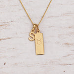 Gold Initial and Taurus Zodiac Necklace with letter S pendant