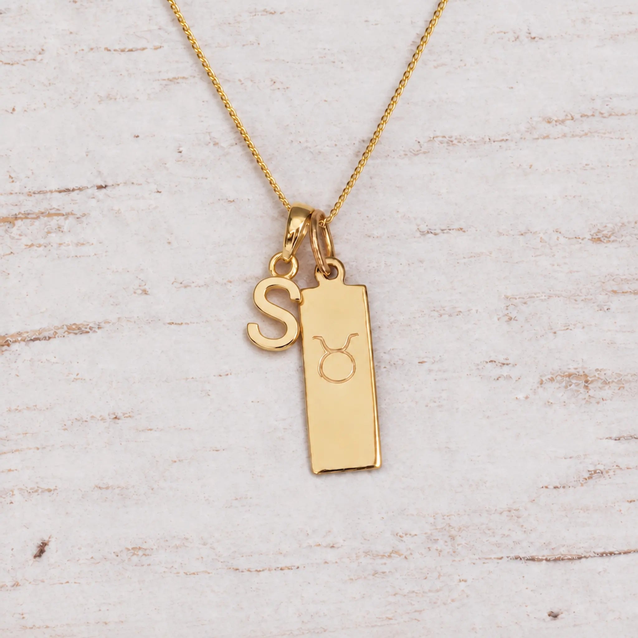 Gold Initial and Taurus Zodiac Necklace with letter S pendant