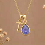 Gold Initial T and December Birthstone natural Tanzanite Necklace on a warm background