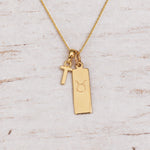 Gold Initial and Taurus Zodiac Necklace with letter T pendant