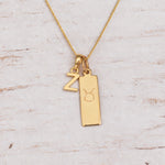 Gold Initial and Taurus Zodiac Necklace with letter Z pendant