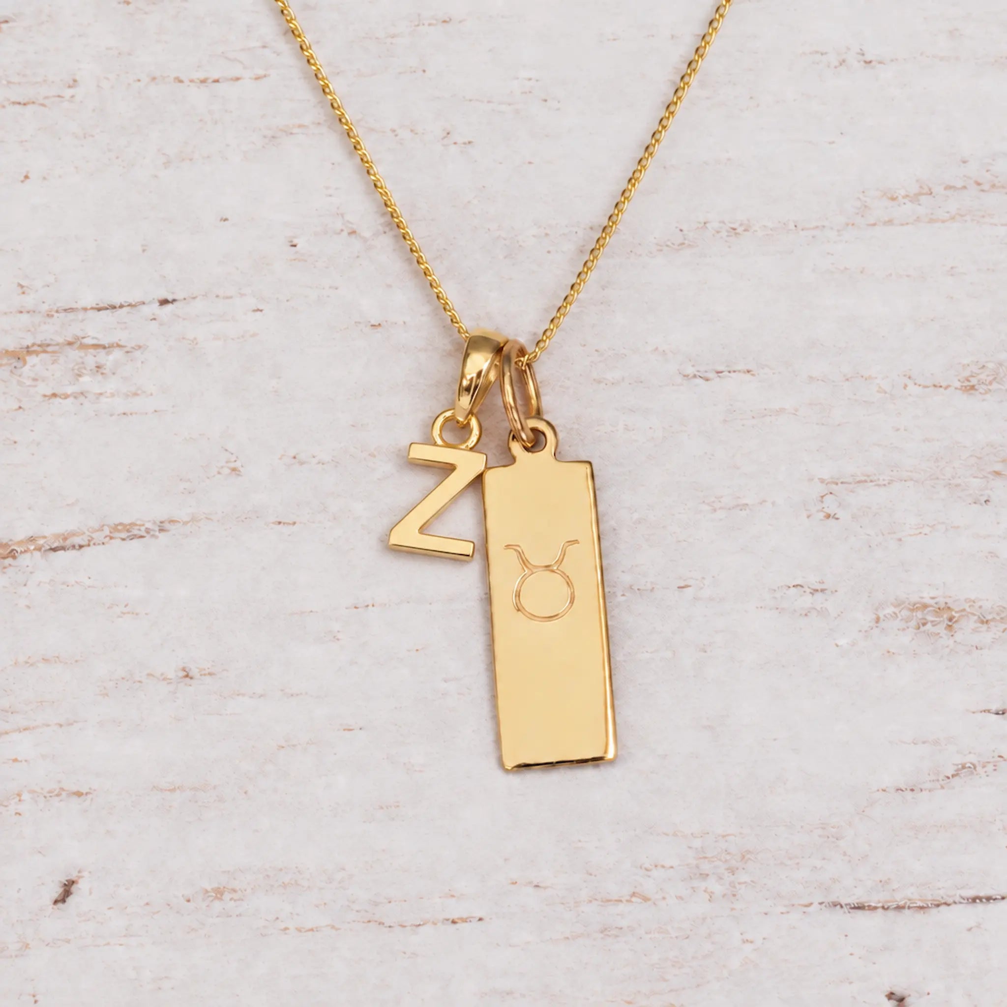 Gold Initial and Taurus Zodiac Necklace with letter Z pendant
