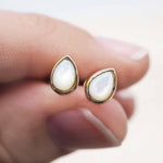 gold june birthstone mother of pearl earrings held - june birthday jewellery gift for her