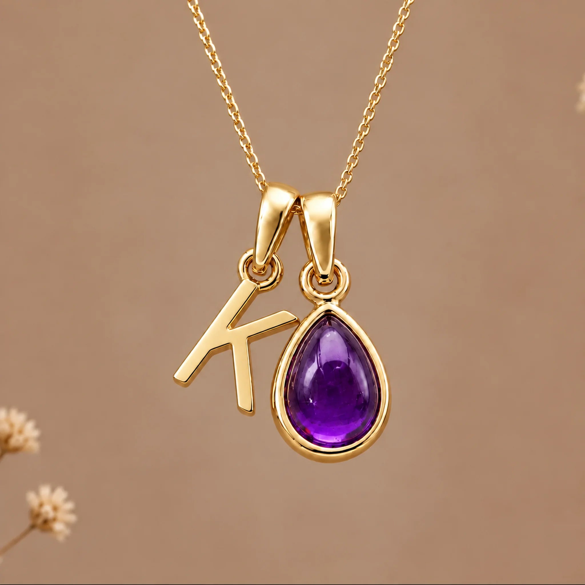 Gold initial K necklace with a natural February amethyst