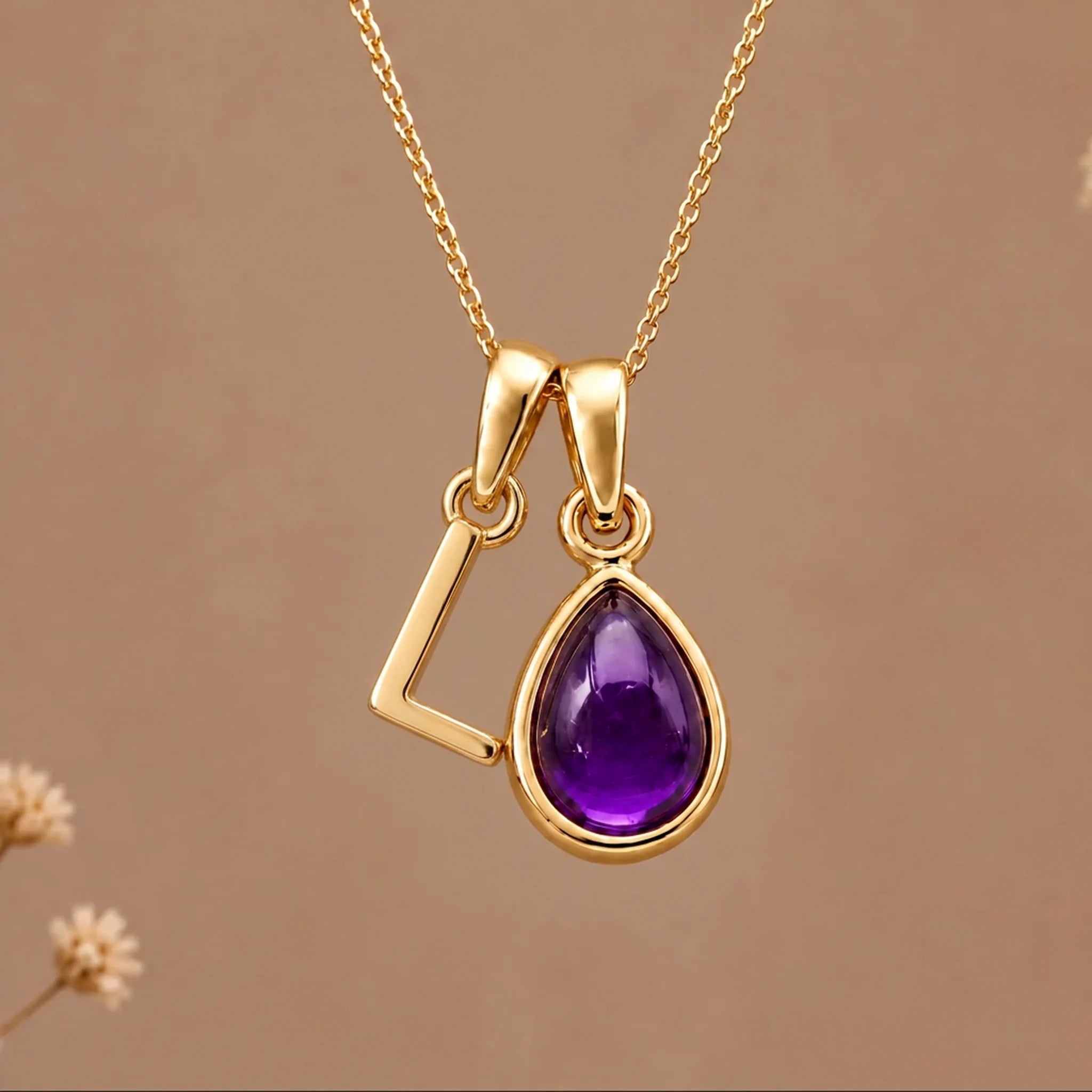 Gold initial L necklace with a natural February amethyst