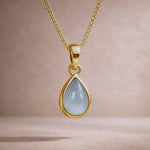 Gold March birthstone necklace with a pear-shaped natural aquamarine gemstone pendant - meaningful gift for her