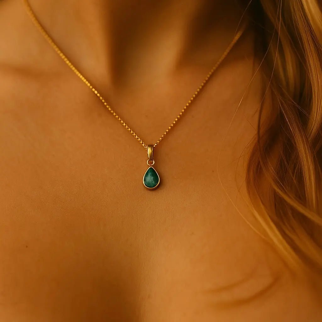 gold may birthstone emerald necklace worn as part of our May birthstone Jewellery Set