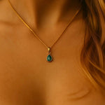 gold may birthstone emerald necklace worn as part of our May birthstone Jewellery Set