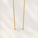 Close view of mother of pearl clover necklace