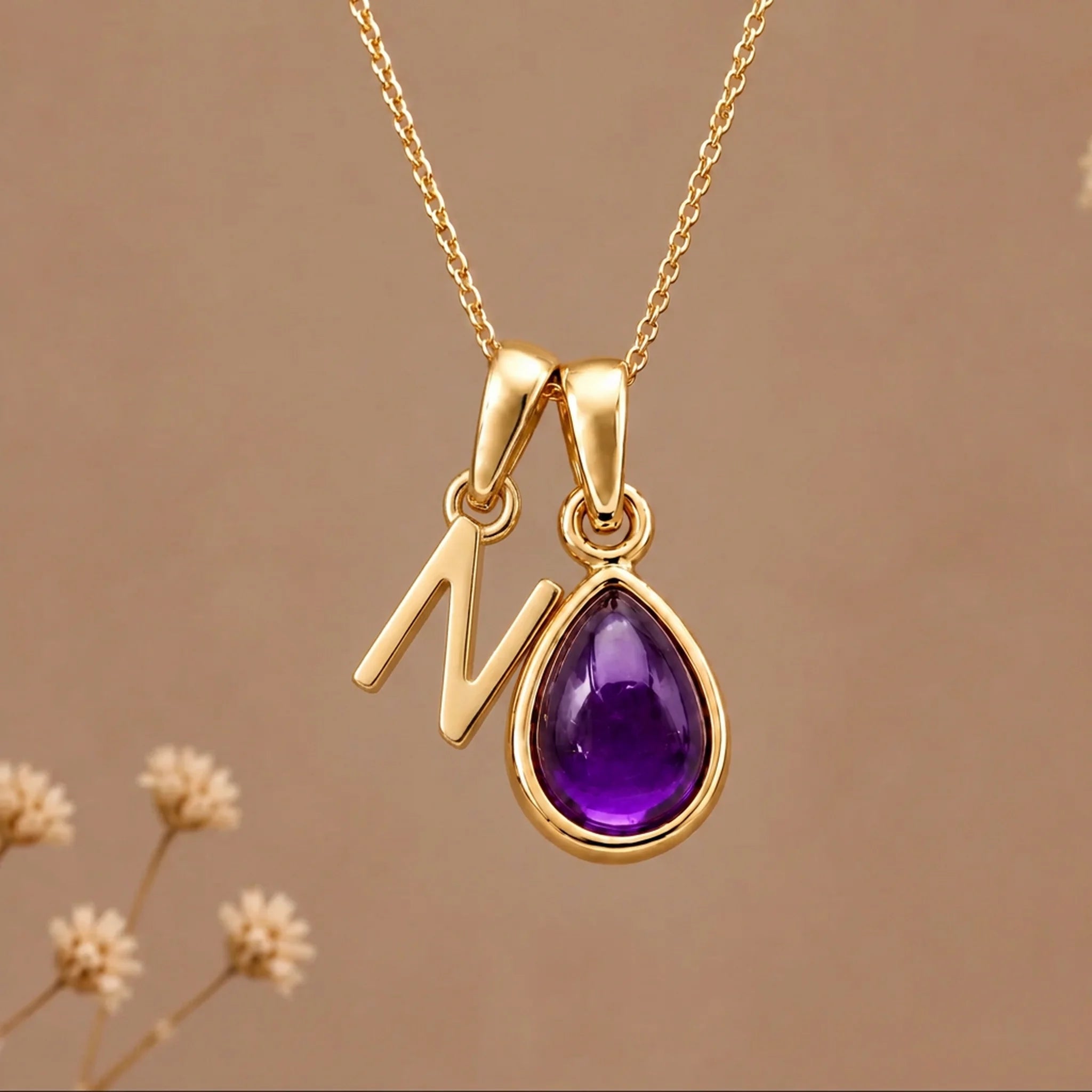 Gold initial N necklace with a natural February amethyst