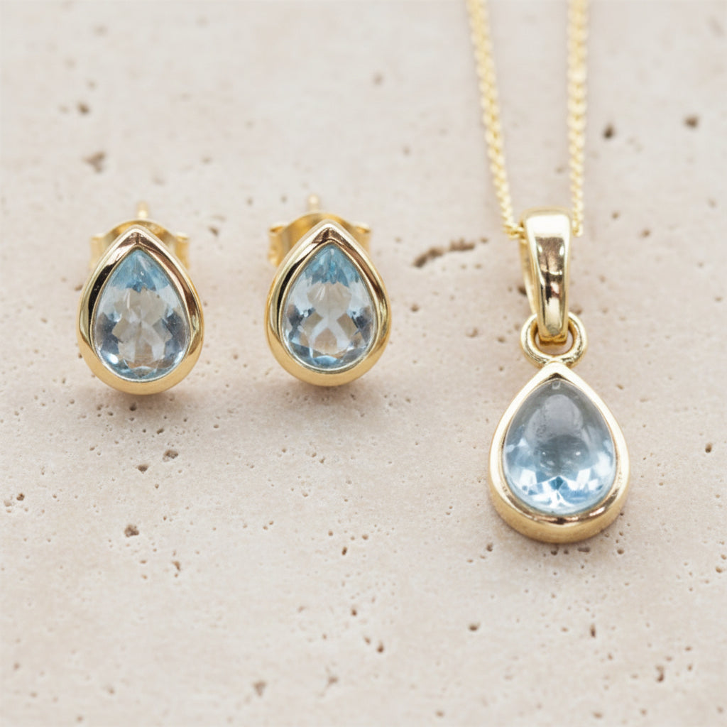 Gold November Birthstone blue topaz earrings and blue topaz necklace by indie and harper australia