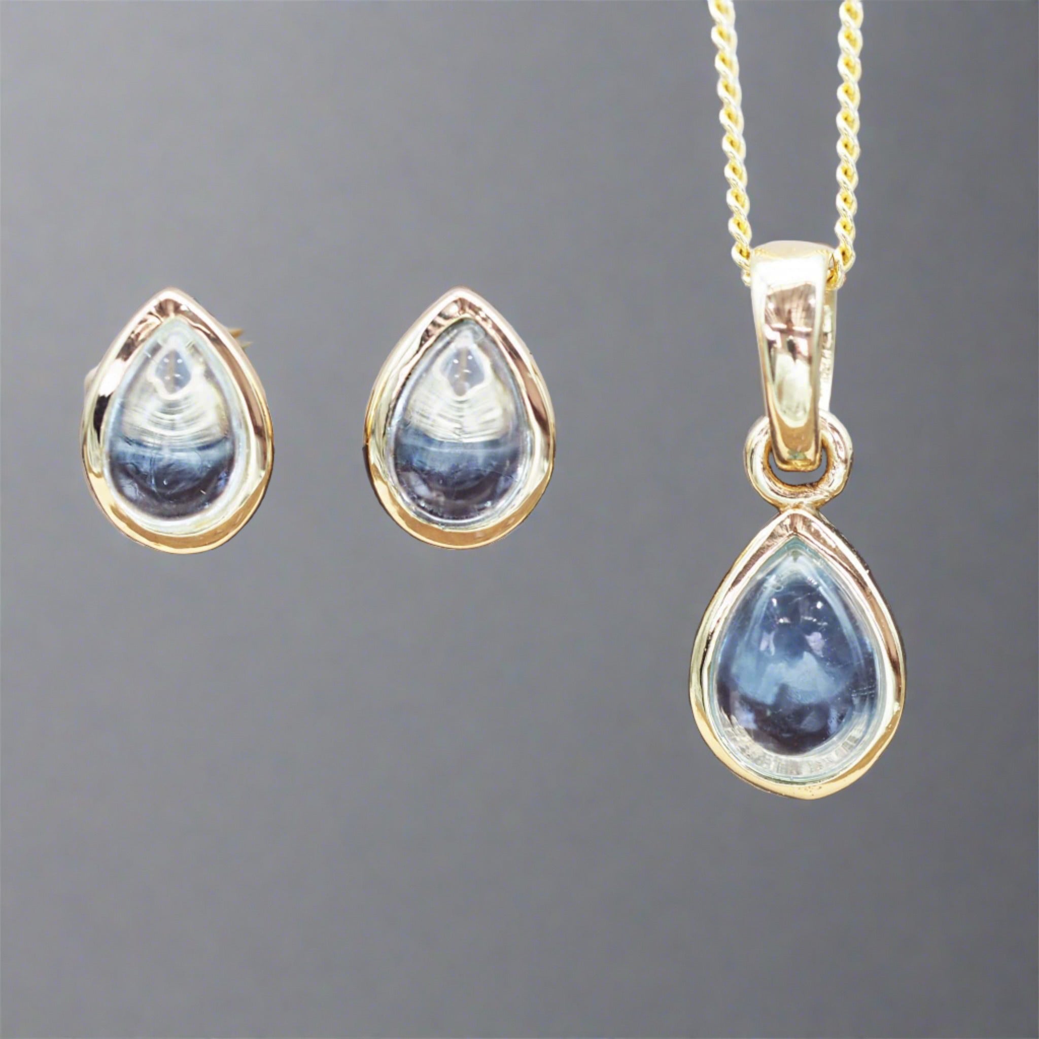 Gold November Birthstone blue topaz earrings and blue topaz necklace by indie and harper australia